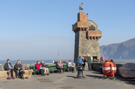 Lynmouth, North Devon, England, UK. March 2019. Lynmouth pier on the West Lyn River with the historic Rhenish Towerのeditorial素材