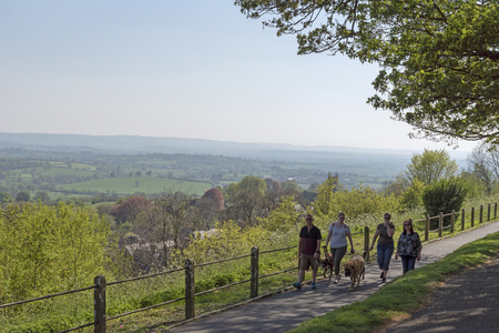Shaftesbury, Dorset, England, UK. April 2019. Dog walkers on The Shaftesbury Heritage Trail.のeditorial素材