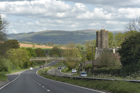 Dean Prior, South Devon, England, UK. May 2019. The A38 Devon Expressway and St George the Marty church overlooked by the Dartmoor National Park.のeditorial素材