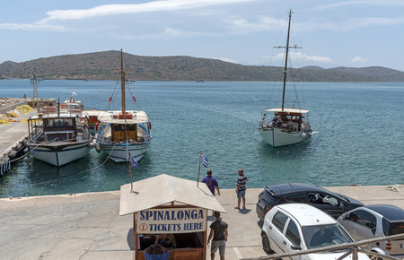 Plaka, Crete, Greece. June 2019. Booking office for ferries operating the trip to Spinalonga Island a former Leper Colony.のeditorial素材