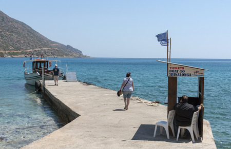 Plaka, Crete, Greece. June 2019. Booking office for ferries operating the trip to Spinalonga Island a former Leper Colony.のeditorial素材