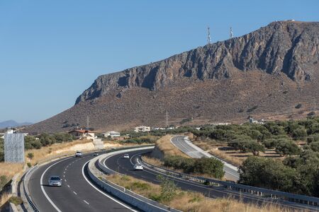 Heraklion, Crete, Greece. October 2019. New opened National Road, the A90, E75 dual carriageway section between Heraklion and Malia, heading towards Agios Nikolaos.のeditorial素材
