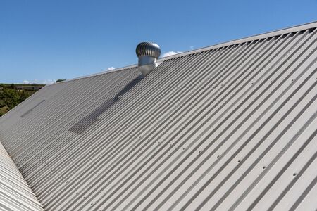 Elgin, Western Cape, South Africa. December 2019. An overview of a new new roof with an extractor fan の写真素材