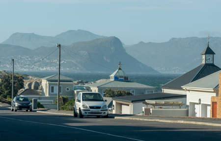 Simon's Town, Western Cape, South Africa. Dec 2019. Properties on the coastal road at Simon's Town with mounyainous background, Cape peninsula, South Africa.のeditorial素材