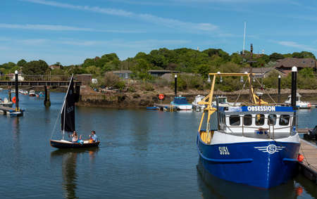 Lymington, Hampshire, England, UK, May 2020.  Family sailing a Laser Radial sailing boat on the Lymington River, Southern England, UK.のeditorial素材