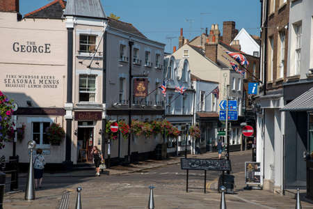 Eton, Buckinghamshire, England, UK. 2020. Eton High Street seen from the Windsor Eton bridge with...