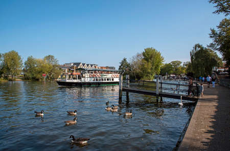 Windsor, Berkshire, England, UK. 2020. Late summer tour boat on the River Thames at Windsor, England.のeditorial素材