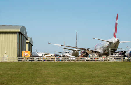 Kemble, Gloucestershire, England, UK. 2020. Retired passenger jet aircraft  wait to be dismantled and recycled on a Gloucestershire airfield.のeditorial素材