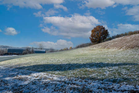 Walpole, New Hampshire, USA. 2020.  An autumnal scene as season's first snow appears on a Walpole farm, USA.の写真素材