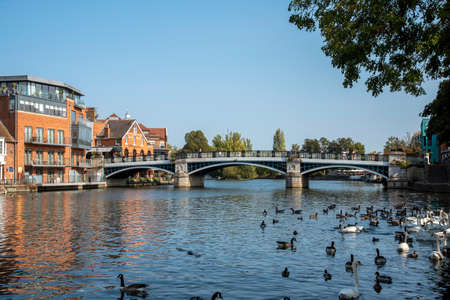 Windsor, Berkshire, England, UK. 2020.  The River Thames passing under the Windsor and Eton Bridge at Windsor, Berkshire, UK.のeditorial素材