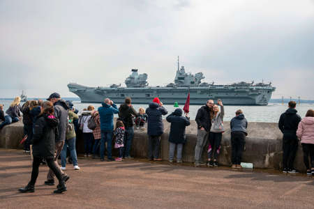 Portsmouth, England, UK. 2021.  Well wishers watch as HMS Queen Elizabeth departs Portsmouth on her...