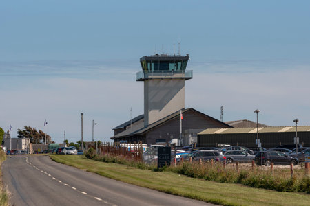 Cornwall, England, UK. 2022. Lands End Airport, control tower and car parking area close to St Just, Cornwall, UK. Flights fly to the Scilly Isles from this location.のeditorial素材