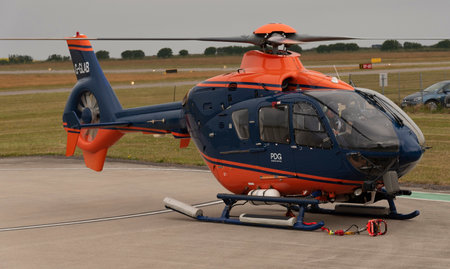 Cornwall, England, UK. 2022. Helicopter on the apron with a carry strap attached for underslung load carrying.のeditorial素材
