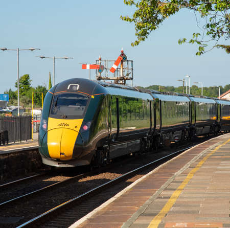 St Erth, Cornwall, England, UK. 2022. London bound railway train departing St Erth station in...