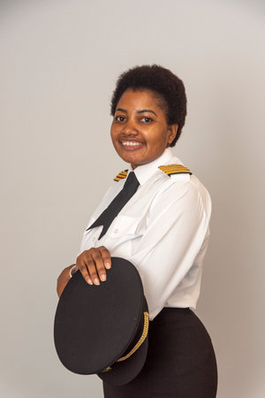 Portrait of a beautiful African captain in uniform