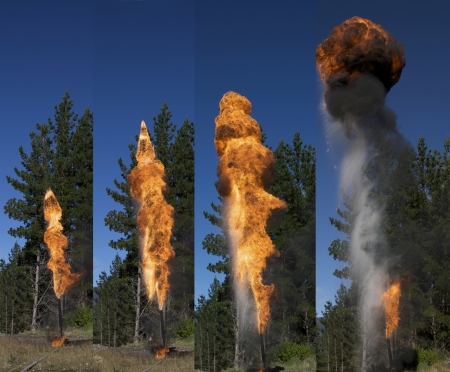 Flare burning off gas and oil at oil well, West Coast, South Island, New Zealandの写真素材