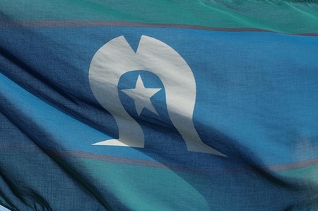 Close up of Torres Strait Islands flag blowing in the wind