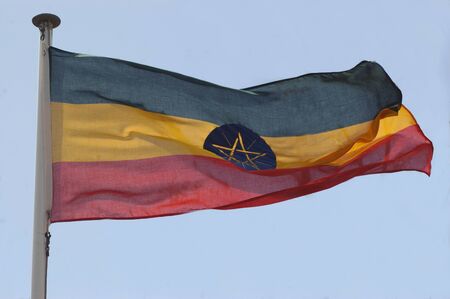  Ethiopian flag against blue skyの写真素材