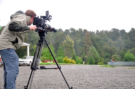 Cameraman and sound recordist at work on the lake