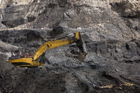 40 ton excavator extracting high grade coal from a seam in Westland, New Zealand