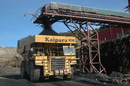 WESTPORT, NEW ZEALAND, CIRCA 2007: Truck loads up with 100 ton of coal at Stockton Coal Mine, West...