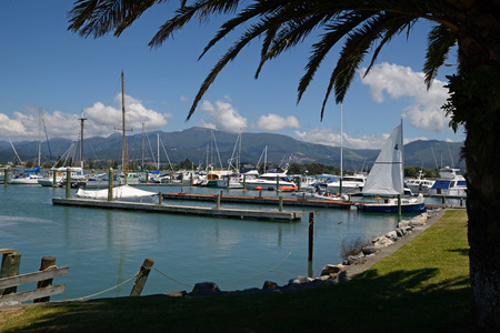 MOTUEKA, NEW ZEALAND, DECEMBER 23, 2014 Sail boats rest at their moorings at the Motueka Yacht club in New Zealand on December 23, 2014のeditorial素材