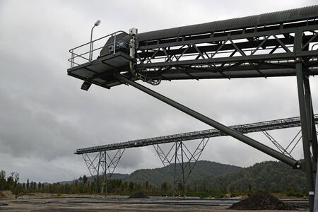 GREYMOUTH, NEW ZEALAND, MAY 20, 2015: Conveyors stand idle at the  Pike River Coal mine on May 20, 2015 near Greymouth, New Zealand, days before it was demolished. 29 miners died at the mine in 2010 and it cannot be reopened.のeditorial素材