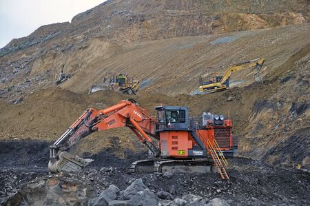 WESTPORT, NEW ZEALAND, MARCH 4, 2015:Machinery at work at an open cast coal mine on March 4, 2015...