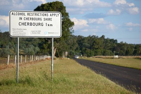 CHERBOURG, AUSTRALIA, MARCH 30, 2016: A road sign warns visitors and residents from bringing alcohol into the town.のeditorial素材