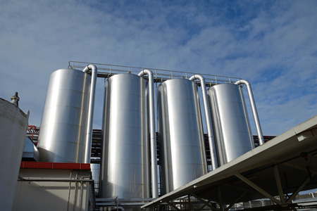 storage silos for cleaning chemicals at a milk factory