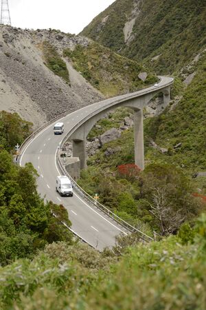 The Otira Viaduct carries traffic safely over a large slip in the Southern Alps near Arthus Pass, Westland, New Zealandの写真素材