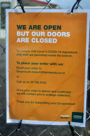 GREYMOUTH, NEW ZEALAND, APRIL 18 2020: Signage shows that a business has restricted access during the Level 4 Covid 19 lockdown in New Zealand, April 18,  2020のeditorial素材