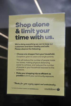 GREYMOUTH, NEW ZEALAND, APRIL 18, 2020: Signage outside a supermarket encourages social distancing regulations during the Covid 19 lockdown in New Zealand, April 18,  2020のeditorial素材