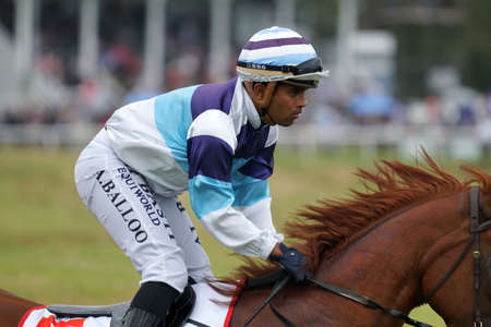 KUMARA, NEW ZEALAND, JANUARY 8, 2022; jockey Akshay Balloo on the field at the Gold Nuggets competition at the Kumara Race Track, January 8, 2022 .のeditorial素材