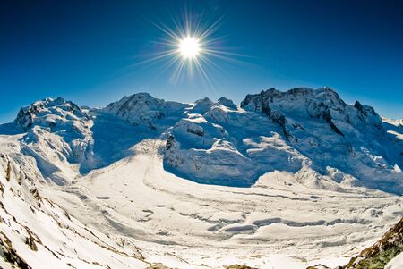 Panoramic view of Monte Rosa, Lyskamm, Breithorn in winter. View from Gornergrat, Zermatt, Switzerland.の写真素材