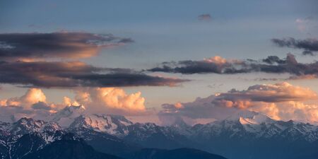 Panorama of Dom, Matterhorn and Weisshorn mountain peaks at sunset. View from Bettmerhorn, Wallis, Switzerlandの写真素材