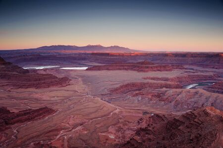 panoramic sunset view from dead horse state park over canyonlands national park, utah, usaの写真素材