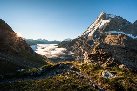 Matterhorn mountain peak view from SAC mountain hut Schoenbiel at sunrise, Zermatt, Switzerlandの写真素材