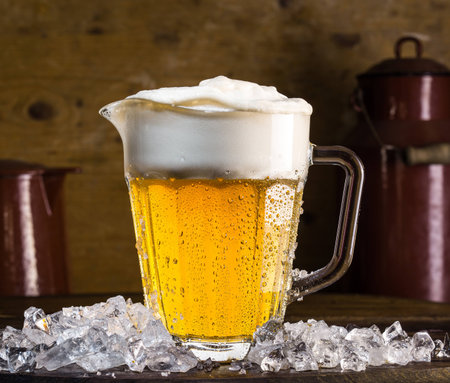 Pitcher of beer on iceの写真素材