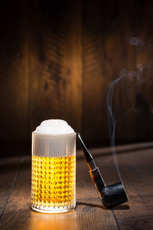 Beer in a glass with pipeの写真素材
