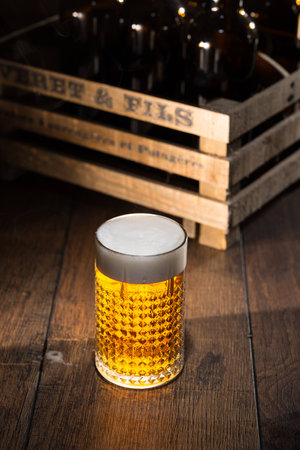 Shiny glass of beerの写真素材