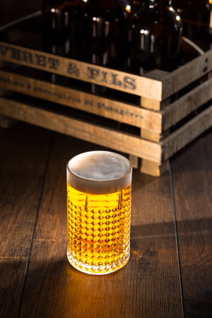 Shiny glass of beerの写真素材