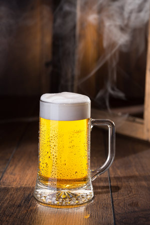 Shiny glass of beerの写真素材
