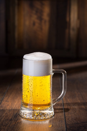 Shiny glass of beerの写真素材