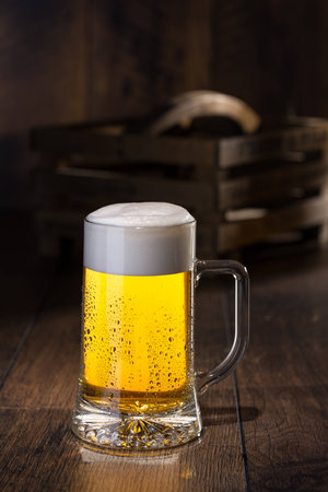 Shiny glass of beerの写真素材