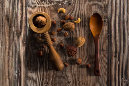 Nutcracker with spoon on a tableの写真素材