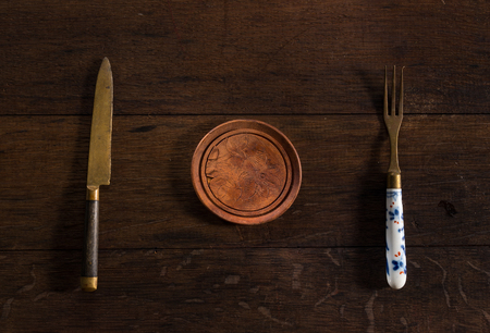 Empy plate with fork and knifeの写真素材