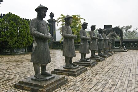 Stone Mandarin Honor Guards at Tomb of Khai Dinh, Hue, Vietnam These sculptures was built in...