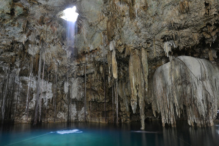 Cenote X-Keken Dzitnup is located 7 km from center of town Valladolid in Yucatan peninsula, Mexico.Horizontal view.の写真素材