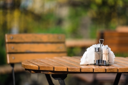 Outdoor Diner Bench with Restaurant Table Accessories.